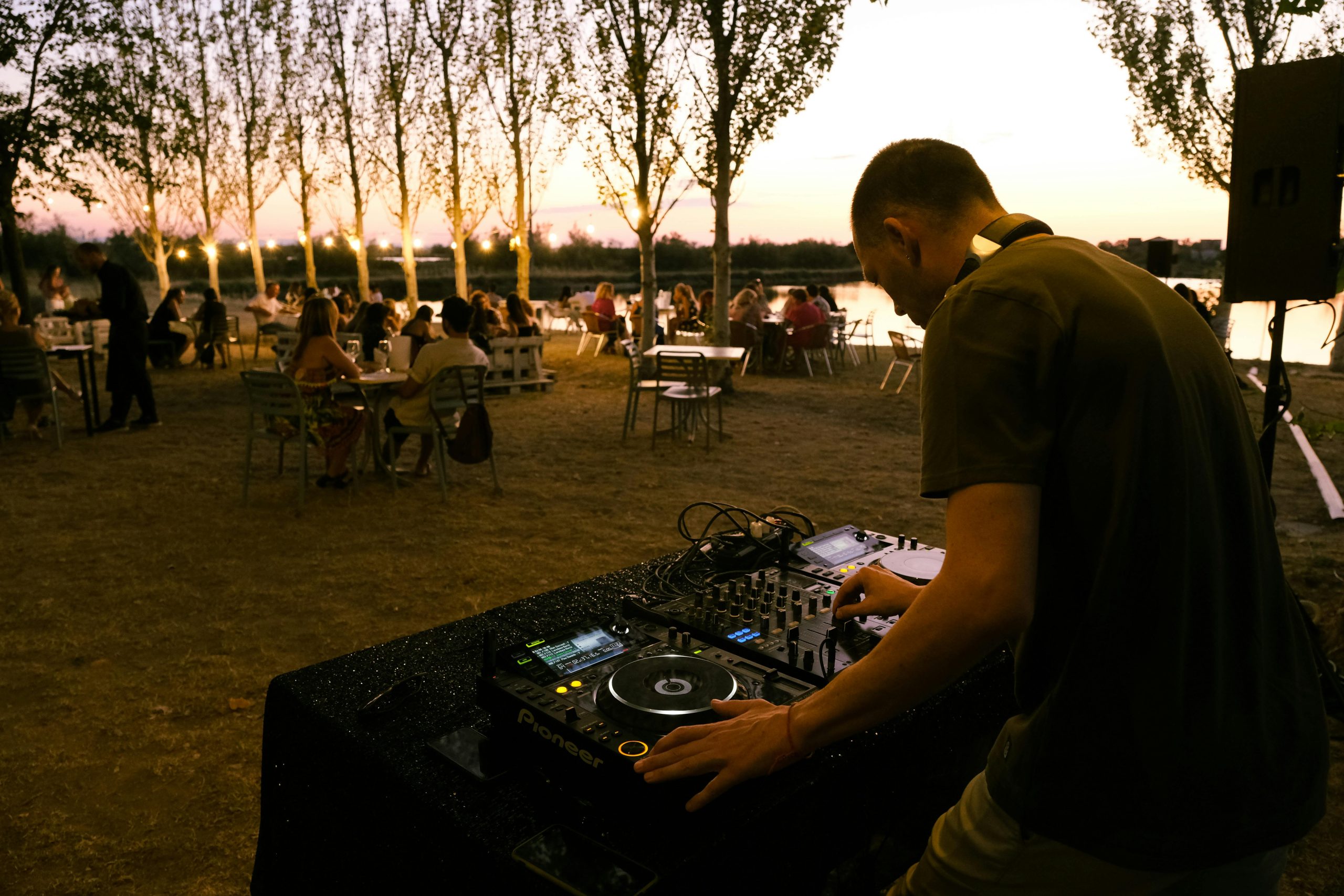 Any clubby/dancey spots with techno-house DJs but that also have tables if people prefer to chill while listening to the music?