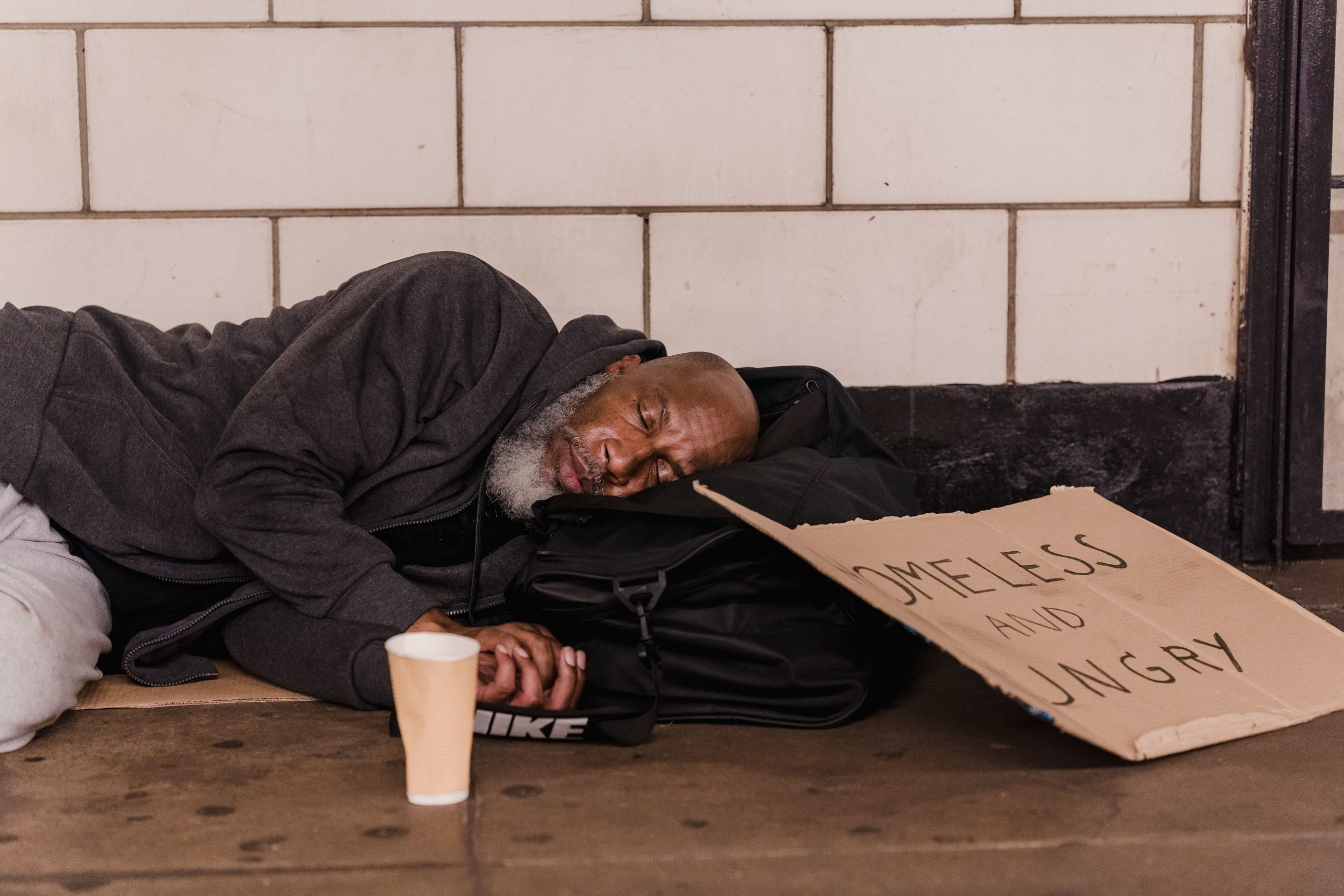 Homeless man teaching gentrified tube goers a lesson in etiquette (North Greenwich)